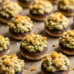 Best Christmas stuffed mushrooms with savory herby filling on recipe card
