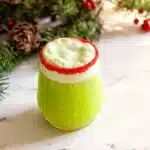 Fizzy green Grinch punch with creamy lime sherbet topping