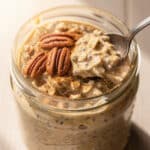 Creamy pumpkin pie overnight oats with chia seeds in a glass jar