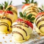 Easter chocolate covered strawberries with lemon white chocolate and festive toppings.