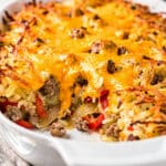 Cheesy hash brown breakfast casserole with golden crispy edges and melted cheese.