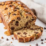 Moist slice of classic banana bread with chocolate chunks and sea salt.