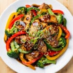 Teriyaki chicken stir fry with broccoli and peppers in glossy sticky sauce