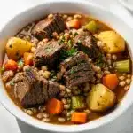 Hearty beef and barley stew recipe with tender chuck roast and vegetables