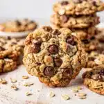 Chewy oatmeal chocolate chip cookies with glossy chocolate chips and crispy edges.