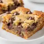 Soft chocolate chip cookie bars with melty chocolate chips and chewy texture