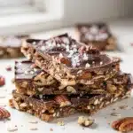 Dark chocolate sea salt nut bars with a dense oat and nut base.