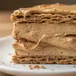 No bake cookie butter icebox cake slices perfectly for weekly treats.