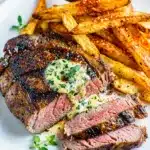 Juicy sliced ribeye steak with golden crispy oven baked frites.