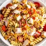 Creamy chicken bacon ranch pasta salad with rotini and fresh vegetables