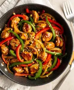 Easy skillet chicken stir fry recipe with tender chicken and crisp bell peppers