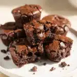 Decadent homemade brownie bites with fudgy crackly texture and glossy chocolate chips