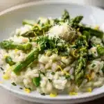 Creamy asparagus risotto with tender spears and al dente rice in close up