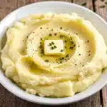 Creamy mashed potatoes recipe with fluffy texture and rich buttery flavor