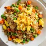 Easy homemade egg fried rice recipe with glossy soy sauce and crispy eggs