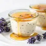Creamy honey lavender panna cotta with glossy texture and floral garnish.