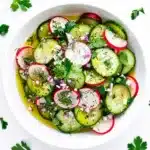 Crisp radish cucumber salad with a bright lemon Dijon vinaigrette dressing.
