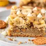 Creamy banana pudding blondies with white chocolate chips and vanilla wafers.