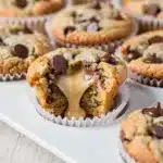 Cadbury Creme Egg cookie cups with gooey melted filling and chocolate chips.