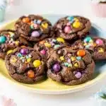 Cadbury mini egg brownie cookies with glossy chocolate and crispy candy shells