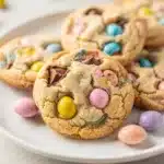 Cadbury Mini Egg sugar cookies with soft centers and colorful candy pieces.