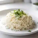 Cilantro lime rice recipe with vibrant green herbs and fluffy white grains