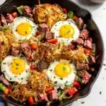 Hearty corned beef hash breakfast skillet with eggs and crispy potatoes