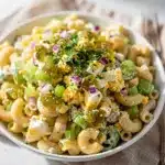 Creamy macaroni salad recipe with sweet pickle relish and fresh vegetables.