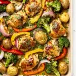 One pan garlic butter chicken and veggies with roasted potatoes and broccoli.