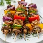 Juicy grilled chicken and veggie kebabs with colorful bell peppers and zucchini