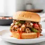 Savory homestyle sloppy joe skillet with ground beef and toasted bun.