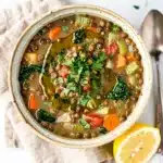 Creamy Mediterranean lentil soup recipe with vibrant vegetables and fresh herbs.