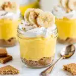 Creamy no bake banana pudding cheesecake cups with vanilla wafer crust