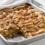 Snickerdoodle cookie bars with crackly cinnamon sugar crust and soft chewy interior