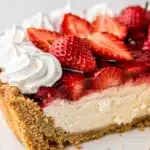 Strawberry icebox pie slice with creamy filling and fresh berry topping