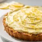 Close-up slice of Frozen Lemonade Pie with creamy filling.