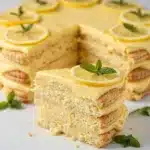 Lemon Icebox Cake slice with bright lemon cream and softened biscuits layers