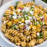 Creamy street corn pasta salad with charred corn and cotija cheese