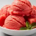 Refreshing watermelon sorbet in a chilled white bowl