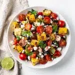 Grilled Corn Salad Patriotic with cherry tomatoes and feta.