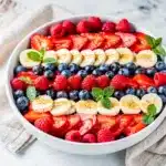 Patriotic fruit salad with honey lime poppy seed dressing